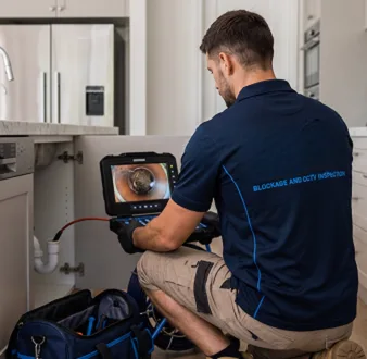 Clearing a blocked sink at a Birchgrove property